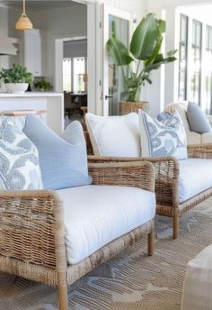 a living room filled with furniture and pillows