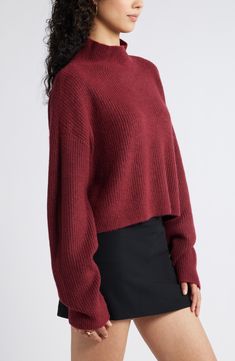 Be ready for chilly forecasts in a supersoft sweater that's topped with a ribbed mock neck and framed by roomy dropped shoulders. Mock neck Long sleeves Dropped shoulders 34% acrylic, 33% polyester, 30% recycled polyester, 3% spandex Machine wash, dry flat Imported Red Grape, Sweaters Women, Red Grapes, Crop Sweater, Burgundy Sweater, Holiday Sweater, Be Ready, Mock Neck Sweater, Red Sweaters