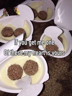 some white bowls filled with food on top of a brown tablecloth and the words if you get me one off these my heart is yours