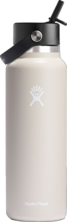 a white hydro flask with a black lid