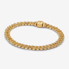 Elevate your look with the Pavé Cuban Chain Bracelet. This 14k gold-plated bracelet features sparkling links in a chain. The top of each half circle is set with three round stones, while the back of the chain is polished for shine and comfort. The bracelet closes with a flat, square-shaped clasp featuring an engraved Pandora logo. - Pandora Pavé Cuban Chain Bracelet - 14k Gold-plated unique metal blend / Cubic Zirconia / Clear - Sz. 7.9 in Pandora Cuban Bracelet, Charms Disney, Pandora Pave, Pandora Logo, Pandora Essence, Cuban Chain Bracelet, Cuban Bracelet, Bracelet Tennis, Bracelet Pandora