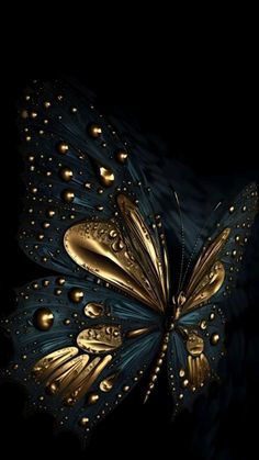 a gold and blue butterfly with drops of water on it's wings, against a black background