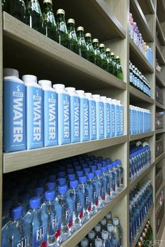 shelves filled with water and bottled beverages