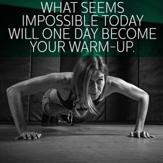 a woman doing push ups on her stomach with the words, what seems impossible today will one day become your warm - up