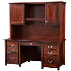 a wooden desk with drawers and cupboards