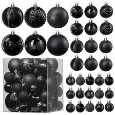 black christmas balls and ornaments are arranged on a white background