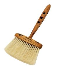 a wooden handle dust brush on a white background