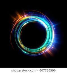 an abstract circular design with bright lights on a black background