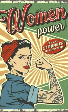 a woman with tattoos on her arm and arms is in front of an advertisement for women power