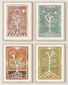 four framed art pieces with flowers and leaves on them, each featuring different colors in the same