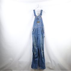 Vintage 50s 60s Womens 26 Thrashed Sanforized Cotton Flared Denim Overalls Usa Womens Overalls Thrashed. Distressed And Faded. Has Stains All Over. Usa Made Womens 26 Measurements Are: 13.5 Inches Across The Waist 34 Inch Inseam 61.5 Inches From Top To Bottom 9.75 Inch Leg Opening Blue Cotton Check Out My Other Items In My Store! I272 Retro Medium Wash Cotton Overalls, Vintage Dark Wash Cotton Denim Jumpsuit, Vintage Cotton Denim Jumpsuit In Medium Wash, Vintage Blue Cotton Overalls, Vintage Denim Blue Cotton Jumpsuit, Vintage Cotton Denim Jumpsuit, Vintage Denim Blue Overalls, Retro Dark Wash Denim Jumpsuit, Vintage Medium Wash Overalls