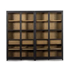 an open bookcase with wooden shelves and black metal frame doors, on white background