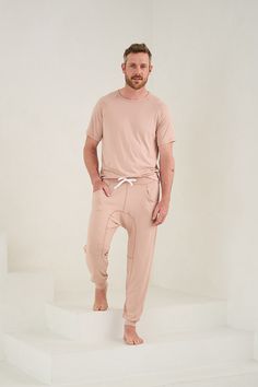 Lounge in comfort and style. Lounge in comfort all day in this incredibly soft loungewear set. This set includes lounge pants with pockets and cuffed ankles and a matching raglan sleeve t-shirt. Made from our ultra-soft and moisture-wicking fabric blend. Made in Canada. 93% Viscose from Bamboo / 7% Spandex. Fits true to size. Available in S, M, L, XL. S (28-30), M (32-34), L (36-38), XL (40-42). Machine washable and dryer friendly. Mens Athleisure, Loungewear Aesthetic, Men Loungewear, Athleisure Men, Black Lounge, Bamboo Pajamas, Style Lounge, Mens Loungewear, Pants With Pockets