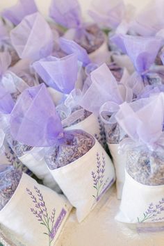 several bags filled with lavender flowers on top of a table