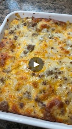 a casserole dish with cheese and meat in it