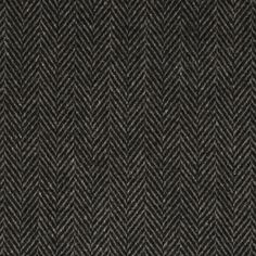 black and grey herringbone fabric textured with small, straight lines on the side