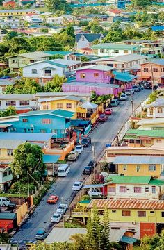 an aerial view of a city with colorful houses