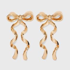 Wrap your look up with the SUGARFIX by BaubleBar Gold Bow Statement Studs. Crafted with glossy gold for a stunning shiny finish. These earrings are perfect for dinner plans, celebrations, or even formal events. Style with pulled back strands or a sleek up-do to really let these earrings shine. Perfect to last all year with this timeless style, it is such a classic look. Statement Stud Earrings, Dinner Plans, Preppy Jewelry, Jewelry Accessories Ideas, Statement Drop Earrings, Jewelry Essentials, Jewelry Lookbook, Bow Earrings, Girly Jewelry