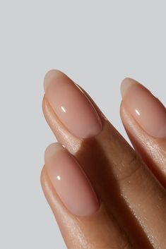 This shade gives off a subtle warm glow and is perfect for those looking for a fresh and fruity look. Inspired by the oil derived from our late summer’s favourite fruit. A sheer, peachy shade. A lipgloss look for your nails. Clean Nail Look, Nails Clean Look, Nude Sheer Nails, Natural Nails No Polish, Nails Authentic, Fresh And Clean Aesthetic, Subtle Summer Nails, Apricot Nails, Lipgloss Nails