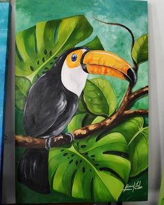 a painting of a toucan perched on a tree branch