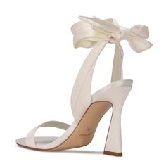 Step up your shoe game with the Nine West Kelsie dress sandal. This eye-catching style features a trendy sculpted high heel and soft textured fabric wraps around the ankle. Trendy yet chic the Kelsie sandal will elevate any outfit. Ankle Wrap Wedding Shoes, Ankle Tie Wedding Shoes, Ankle Wrap Heels, Gossip Girls, Dr Shoes, Pastel Outfit, Wrap Heels, Shoe Inspo, Grad Dresses