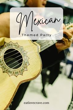 a man is playing an acoustic guitar with the words mexican themed party in front of him