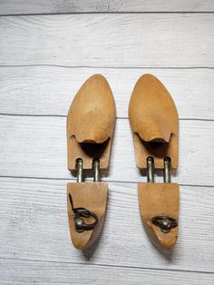 This listing is for a pair of pre-owned vintage wooden shoe stretchers, also called shoe tree forms.  They are unbranded.  Each measures 11.5" long.  Included are a left and a right form.  They are in overall great, pre-owned condition with the expected wear/tear and discoloration/staining from age and prior usage.  Some scuffs/scratches, as well.  See pictures for best idea of condition. Items come from a smoke free home.  Sold as is, returns are not accepted. Please remember the items I sell a Shoe Stretcher, Wooden Shoe, Cleaning Items, Wooden Shoes, Shoe Tree, Shoe Insoles, Shoe Care