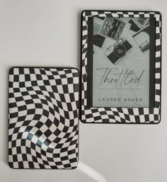 two black and white checkered coasters sitting next to each other