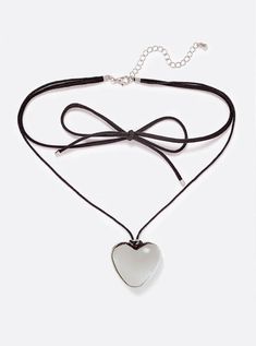 Elevate your style with our Black Faux Suede Necklace featuring a sleek silver heart pendant. This chic accessory pairs the rich texture of black faux suede with the timeless elegance of a silver heart, creating a piece that’s both edgy and refined. The soft, black faux suede cord adds a touch of modern sophistication, while the gleaming silver heart pendant brings a hint of sparkle and romance. Ideal for adding a stylish edge to your everyday look or complementing your evening ensemble. Refresh your jewelry collection with the Black Faux Suede Necklace with Silver Heart—where contemporary cool meets classic charm. 💫🖤 Suede Necklace, Black Cord Necklace, Bar Jewelry, Silver Heart Pendant, Suede Cord, Chic Accessories, Cord Necklace, Rich Textures, Soft Black