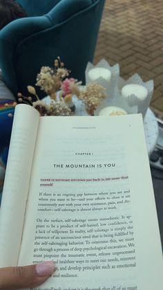 someone is reading the mountain is you book