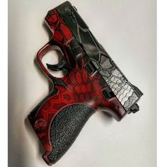 Look at this sweet M&P Shield 9mm pistol we just finished #hydrodipping for our client... Project details: Black M&P SHIELD 9MM  Slide...black parts clear base by OHW applied  #hydrodipped first in Brushed steel from Big Brain Graphics  then double dipped in Kryptek Universal Camo sealed with 2K Matte Clear Coat from OHW  Lower...black parts Red base by OHW applied then distressed to show faded red with black  #hydrodipped in Kryptek Universal Camo sealed with 2K Matte Clear Coat from OHW  She's M P Shield 9mm, Revolver Holster, Big Brain, Hydro Dipping, Amazing Ideas, Brushed Steel, Clear Coat