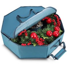 an open suitcase with christmas decorations in it