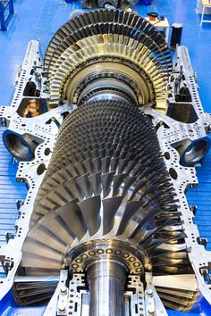 the inside of a large machine with many gears