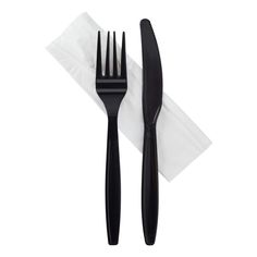 two forks and a knife sitting on top of a white napkin with a black handle