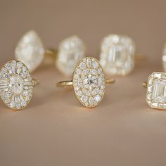 three different types of rings with diamonds on them