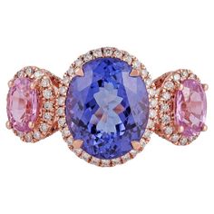 Pink Sapphire - 1.03 Carats Diamond - 0.62 Carat Tanzanite - 3.71 Carat 18KT Gold Pink Sapphire Diamond Ring, 3 Stone Ring, Tanzanite Diamond Ring, Tanzanite Diamond, Pink Sapphire Ring, 3 Stone Rings, Diamond Ring Settings, Sapphire Diamond Ring, Blue Sapphire Rings