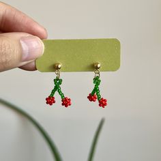 "🍒 cute beaded cherry earrings 🍒 All earring pairs are hand strung with glass beads! Because these are made to order, please allow 1-3 days for me to prepare your order. And due to the nature of being handmade, there may be slight variations within the product. ☁️ materials ☁️ * Czech and Japanese glass seed beads * Gold post: Gold plated stainless steel * Silver posts: Nickel-free iron ☁️ size and dimensions ☁️ * Super lightweight, barely there feeling * With posts: approx. 1\" long ☁️ for ca Beaded Cherry, Beaded Fruit, Cherry Earrings, Fruit Earrings, Earrings Cute, Seed Beads, Etsy App, Selling On Etsy, Sell On Etsy