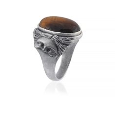 Embrace the timeless beauty of ancient mythology with the Venus De Milo Tiger Eye Ring. This exquisite piece features the serene visage of Venus, the Greek Goddess of Love, set against a captivating tiger eye gemstone. Crafted from premium sterling silver, this ring embodies both elegance and strength, making it a perfect addition to any jewelry collection. The intricate design captures the essence of Venus, also known as Aphrodite, celebrated for her beauty and grace. The tiger eye stone adds a Greek Goddess Mythology, Goddess Mythology, Greek Mythology Goddesses, Eye Ring Silver, Ancient Greek Goddess, Tiger Eye Ring, Rome Antique, Tiger Eye Gemstone, Ancient Mythology