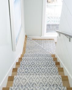 an image of a stair runner in the hallway