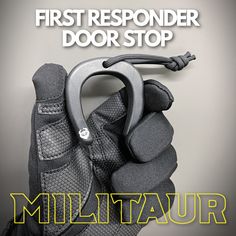 the first responder door stop is in front of a gray background with yellow text that reads millitaur