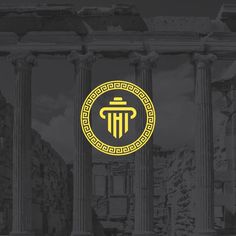 the logo for an ancient greek temple, with columns and pillars in front of it