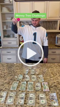 a man standing in front of a kitchen counter with money on it and the words money tree challenge