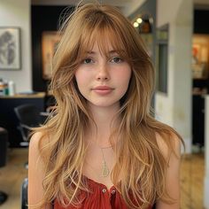 Save this pin for a long layered cut with fringe, a cute and stylish option for those looking to refresh their look. Thinking about adding bangs to your long hair? Tap to explore how this hairstyle can soften your features and add a touch of whimsy, all while keeping your long layers flowing and beautiful.#Hair_Bangs_Long_Layers #Hair_Long_Bangs_Layers #Fringe_With_Layered_Hair #Wispy_Bangs_For_Long_Face Long Fringes For Long Hair, Layered Haircut On Straight Hair, Long Shag Haircut Unstyled, Haircut Long Blonde Hair, Layered Hair Long With Bangs, Long Hair Wolfcut With Bangs, Whimsy Bangs, Boho Fringe Hair, Long Hair Front Bangs