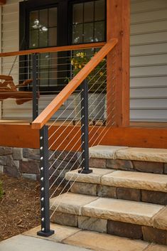 a metal railing on the outside of a house