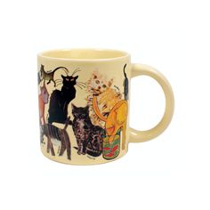 a coffee mug with cats on it