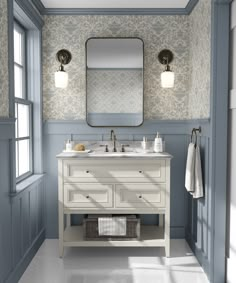 a bathroom with two sinks and a mirror on the wall next to it is shown