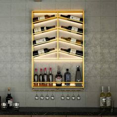 a bar with several bottles and glasses on the counter, in front of a wall mounted wine rack