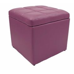 a large purple ottoman sitting on top of a white floor