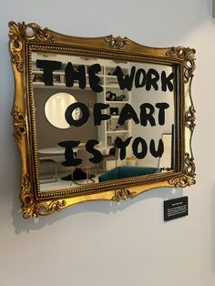 a mirror that says the work of fart is now on display in a museum