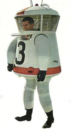 a man dressed in an astronaut suit with the number 3 on it